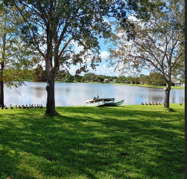Welcome to the Oak Tree lined streets of Hammock Cove at Sawgrass Lakes. This gated community of 126 homes has a club house, fitness room and pool. Located south of the Treasure Coast High School off Darwin Blvd, it's close to Publix, Gatlin Blvd. Walmart, shopping, I-95 and the Turnpike. The monthly HOA fees are very reasonable include lawn maintenance, internet and cable. The shingle roof was replaced in 2021 and the air conditioner was replaced in 2020. The AC compressor was since replaced and the evaporator coil was replaced a month ago. 10 foot flat knock down ceilings with crown molding and chair rail in most rooms. The kitchen has raised panel laminate cabinets, newer quartz countertops and stainless steel appliances. There are a series of connected lakes (see aerial) which we