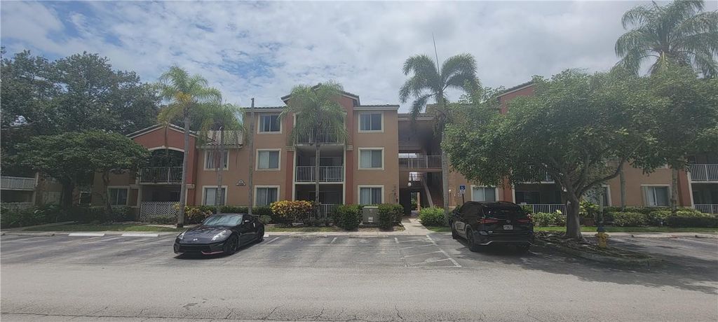 Photo of 3880 Lyons Rd #303, Coconut Creek, FL 33073 (MLS # F10387145)
