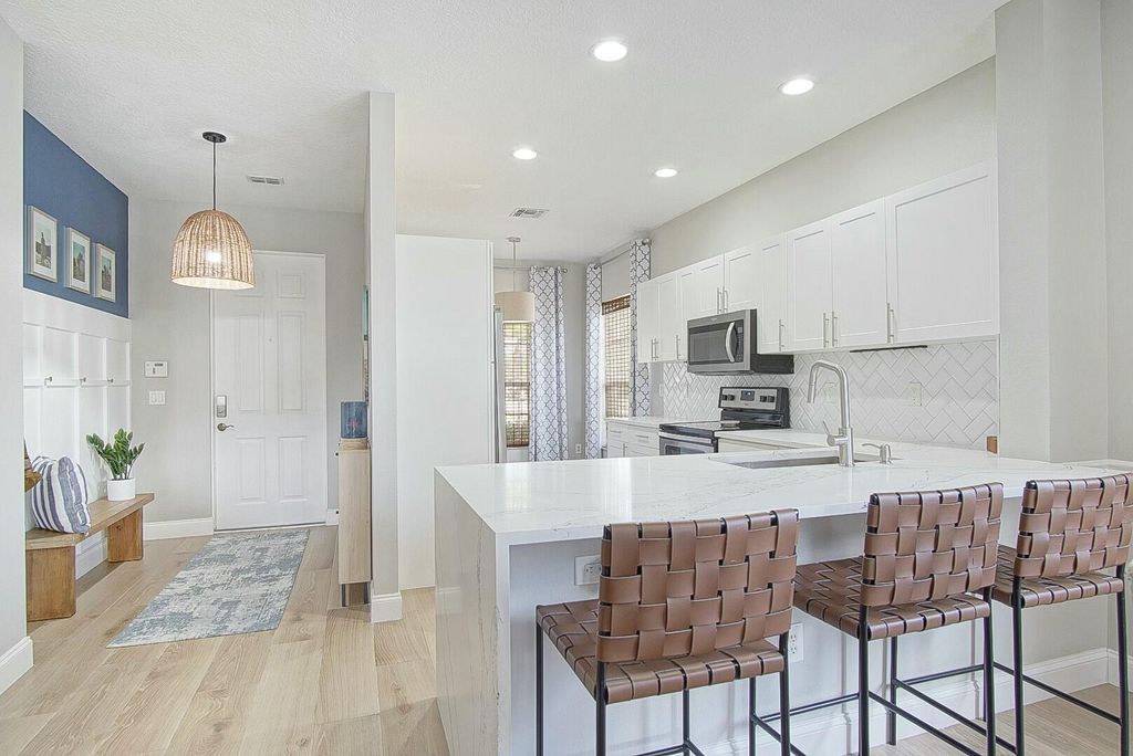 Photo of 9692 SW Flowermound Circle, Port Saint Lucie, FL 34987 (MLS # R11054225)