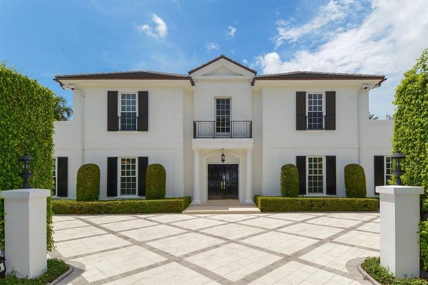 Palm Beach near north end!  Custom two-story traditional home on approximately a 16,300SF property with BR/7Ba.  Perfect for outdoor entertaining with east & west loggias, impeccable gardens with 45' x 15' pool.  Full house generator, 2-car garage, steps from the lake path and ocean access.