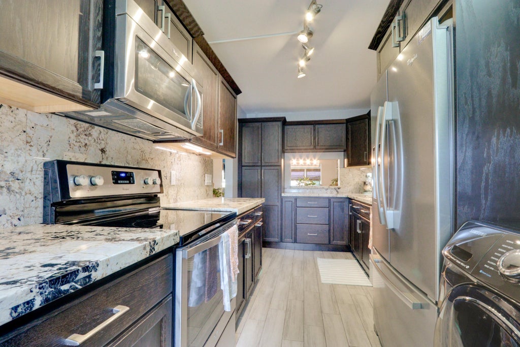 Photo of 2800 FIORE Way #115, Delray Beach, FL 33445 (MLS # B26073519)