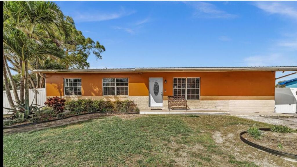 Photo of 848 SE 3rd St, Belle Glade, FL 33430 (MLS # B26000504)