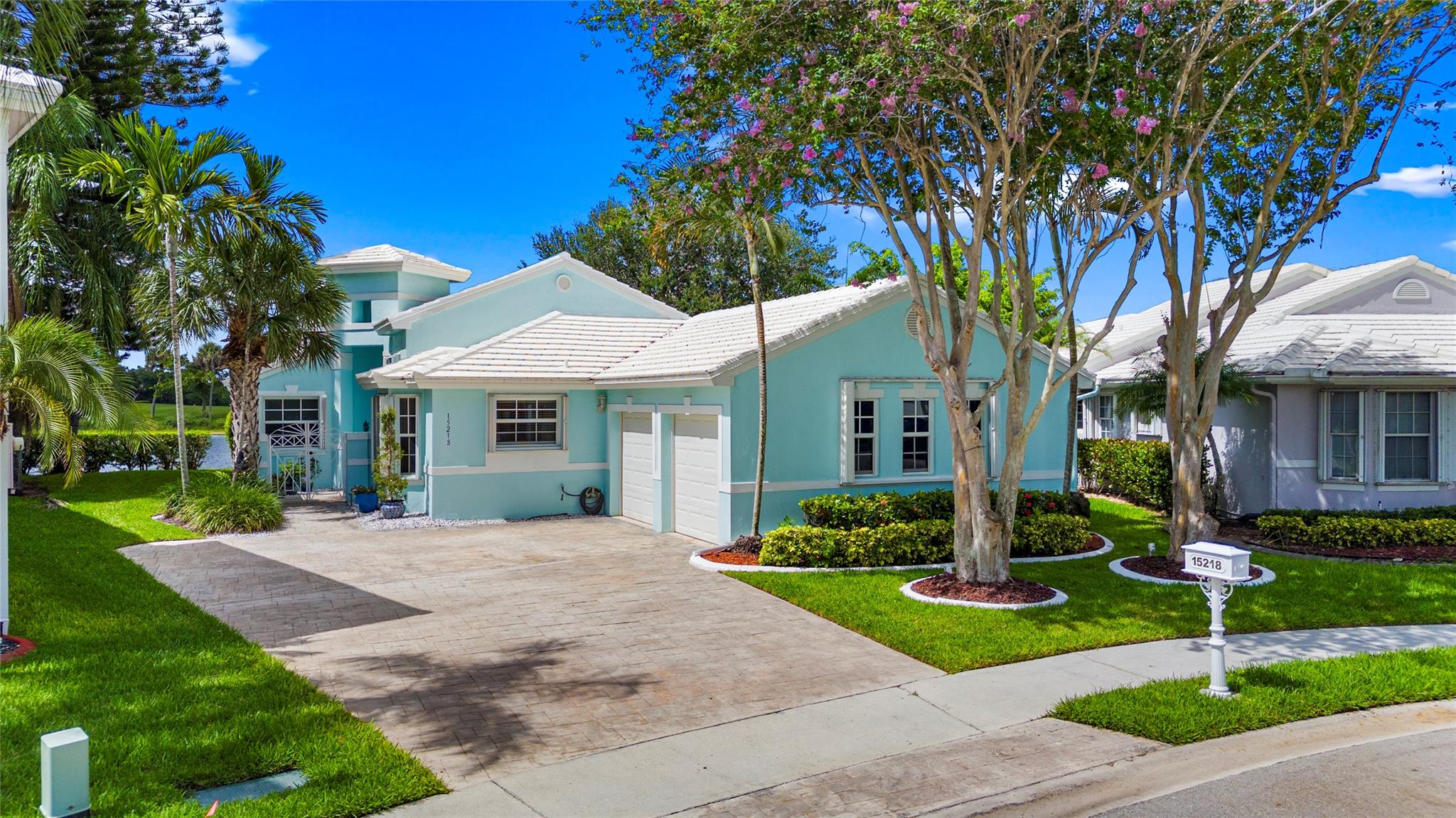 Beautifully renovated 3 BD, 2 BA lakefront pool home with screened patio and serene water views. Featuring Impact windows & doors plus accordion shutters, 2013 roof, volume ceilings, wood-look tile flooring throughout, and a spacious layout filled with natural light. The modern kitchen has sleek white cabinets, quartz countertops, upgraded appliances, and a deep farmhouse sink. The primary suite is a peaceful retreat with a renovated spa-like bathroom, frameless glass shower, dual sink vanity & designer tile. 3rd BR has a custom Murphy bed. HOA includes: guard gate, ADT alarm, lawn-care, irrigation, cable, internet, exterior painting & pressure washing. Conveniently located near top-tier schools, shopping, dining & major highways. Your opportunity to own this impeccable move-in ready home.