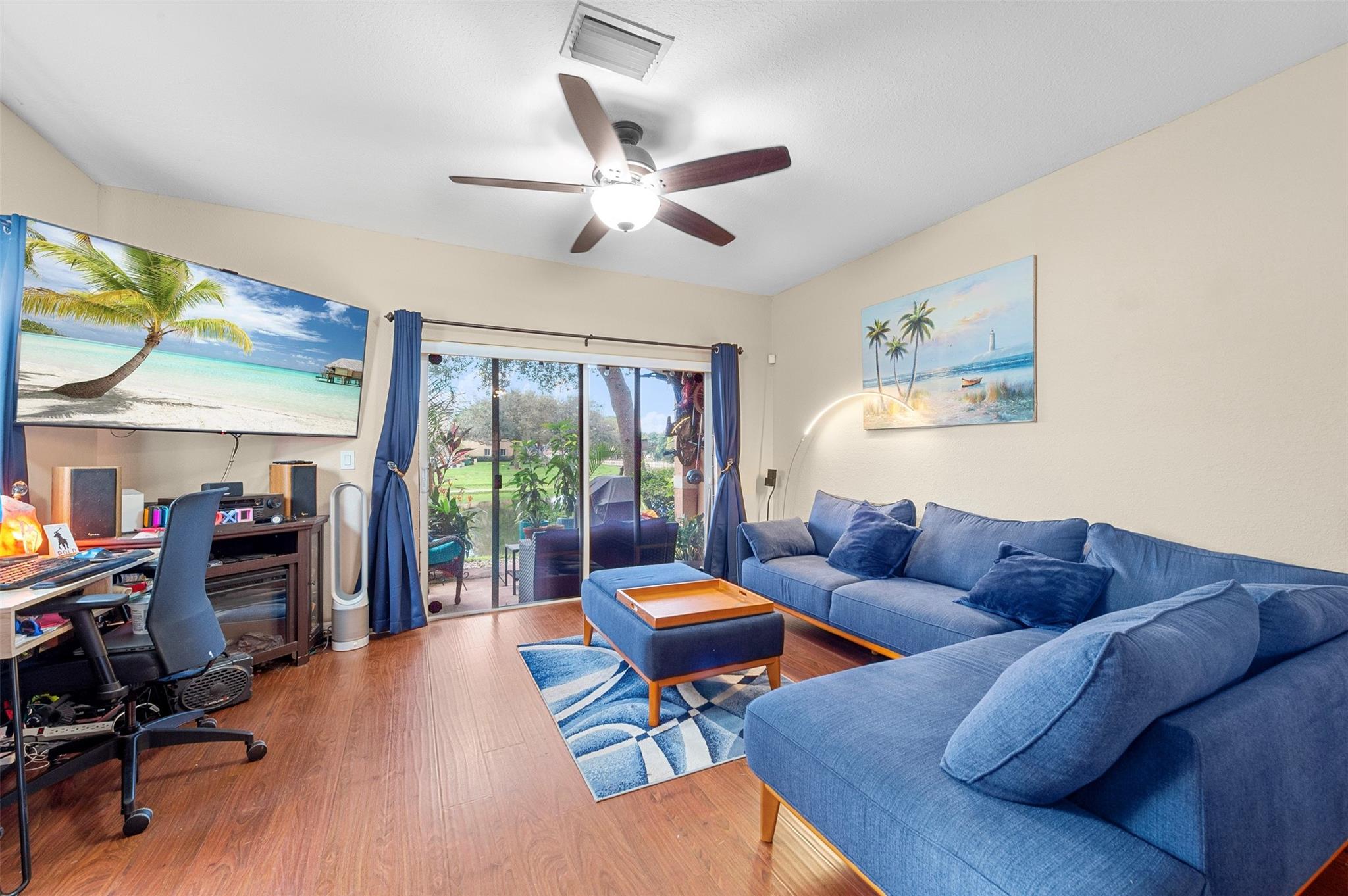 Welcome Home! 2b/2b & 1/2 bath updated townhome corner unit on the lake. With a beautifully updated & spacious kitchen that includes NEW appliances, upgraded light fixtures and wood floors throughout the unit and more. A bright combination of dining & living room with the kitchen featuring a breakfast area, pantry, & snack counter! Two large master suites upstairs each providing full bathrooms, spacious upgraded walk-in closets with lake view. Washer & Dryer In Unit! First floor features storage area under the stairs, as well as a utility closet on the patio. Family friendly neighborhood, close to the Sawgrass Expwy, Sawgrass Mills Mall, Publix, restaurants and downtown Tamarac. 2x assigned parking spots #3-1 right in front unit. Pets under 30lb ok.