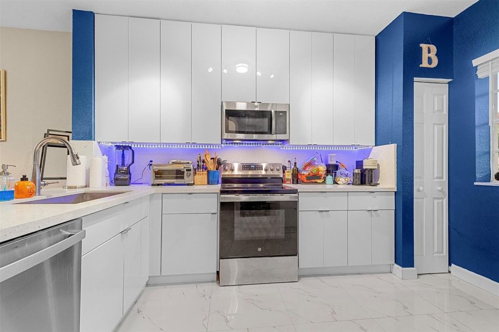 Photo of 5921 Riverside Avenue, Tamarac, FL 33321 (MLS # F10527128)