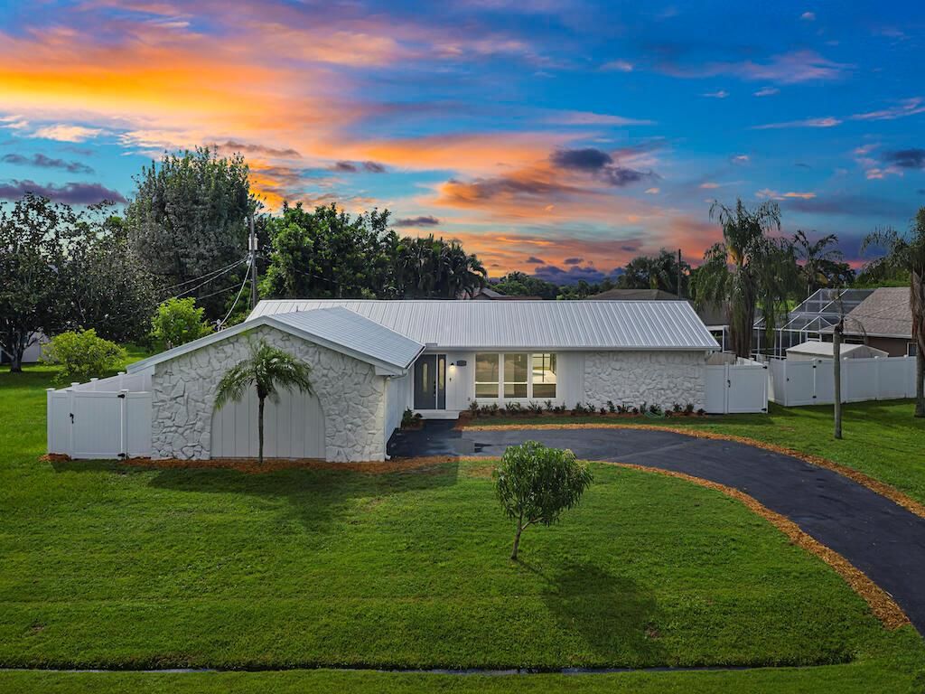 Photo of 1421 SE Bernardo Terrace, Port Saint Lucie, FL 34952 (MLS # R10742479)