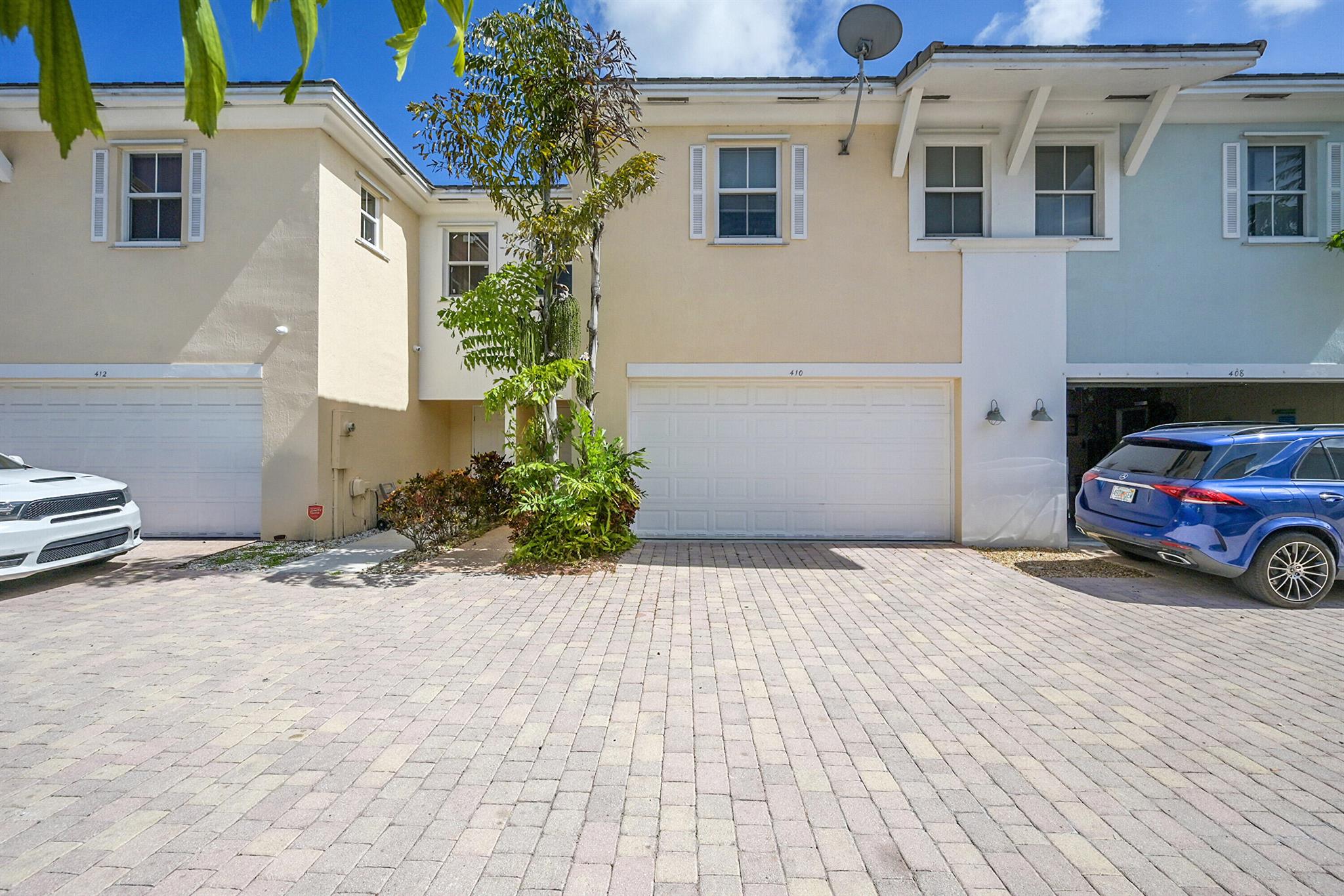 Spacious 3BR/2.5BA Townhome with 2-Car Garage in Pompano BeachWell-maintained townhome featuring open layout, ceramic tile floors, and modern kitchen with granite countertops and stainless steel appliances. Half bath on main floor for guests.Private fenced courtyard with brand-new wood deck, palm trees, and white rock--perfect for relaxing or entertaining.Upstairs offers 3 bedrooms with wood flooring (no carpet). Primary suite includes walk-in closet and updated bath with dual sinks and walk-in shower. Upstairs laundry for added convenience.Impact-rated, noise-reducing windows and doors throughout. Attached 2-car garage.Prime Location:10 mins to beach & restaurants5 mins to I-953 mins to parks & playgrounds