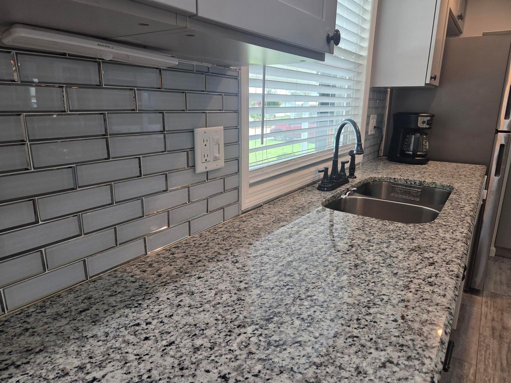 Photo of 7838 SE Continental Drive, Hobe Sound, FL 33455 (MLS # B26001103)