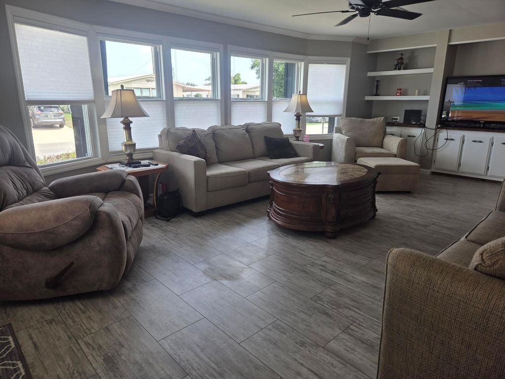 Photo of 7838 SE Continental Drive, Hobe Sound, FL 33455 (MLS # B26001103)