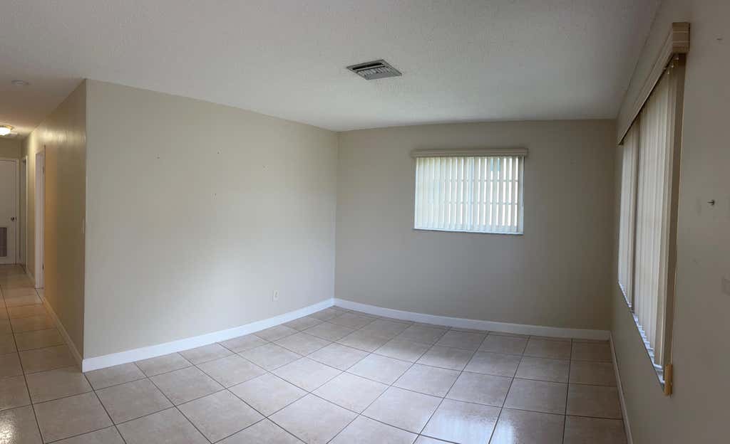 Photo of 1117 NE 23RD Street, Belle Glade, FL 33430 (MLS # B26062729)