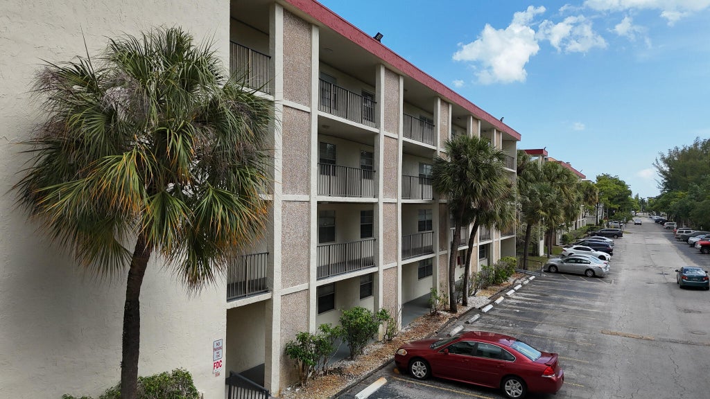 Photo of 3070 NW 48TH Terrace #414, Lauderdale Lakes, FL 33313 (MLS # B26074233)
