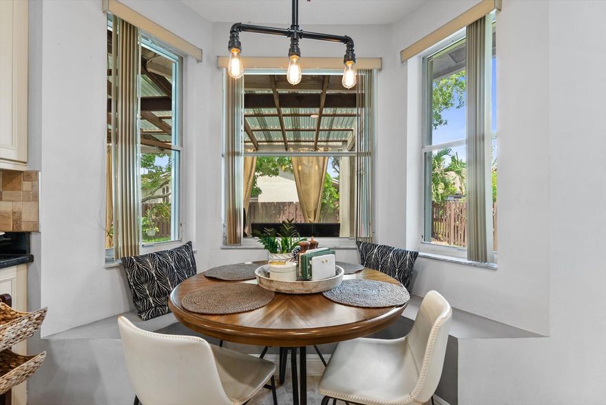 Wow! This 4 bedroom 2.5 bath home offering the perfect blend of comfort, style, and location. Situated in a desirable community with a low HOA, this property features soaring high ceilings that create a bright and open feel from the moment you walk in. The updated kitchen is designed for both everyday living and entertaining, complete with modern finishes, ample cabinet space, and a layout that flows seamlessly into the main living areas. Step outs to our private retreat ideal for relaxing, hosting friends and family, or enjoying South Florida evenings in privacy. Conveniently located near top-rated schools, parks, shopping, dining, and major roadways, this home offers exceptional value in one of Coral Springs most desirable areas. Brand new Roof and hurricane protection.
