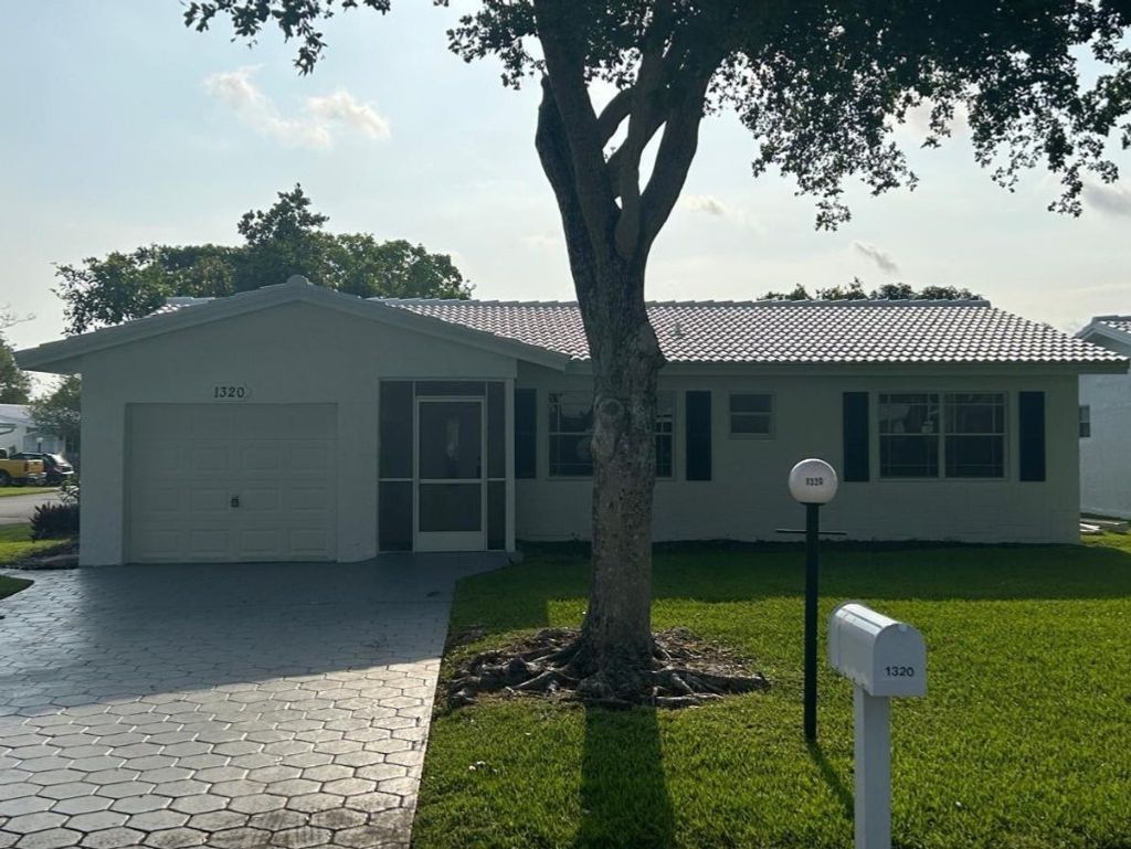 Photo of 1320 NW 85th Avenue, Plantation, FL 33322 (MLS # F10461083)