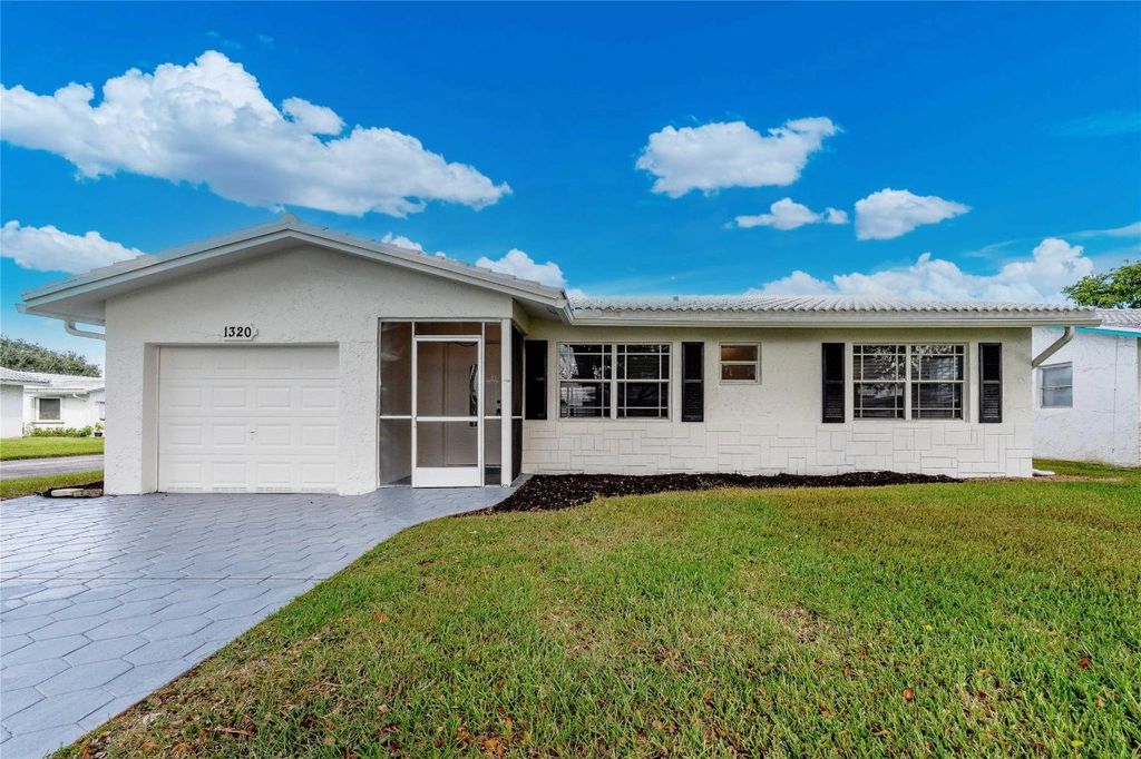 Photo of 1320 NW 85th Avenue, Plantation, FL 33322 (MLS # F10461083)