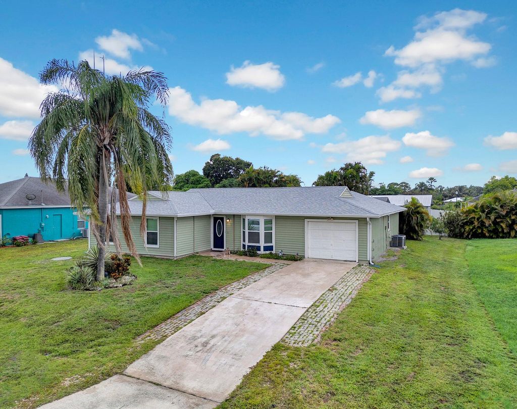 Photo of 1918 SE Cheltenham Street, Port Saint Lucie, FL 34983 (MLS # B26008196)
