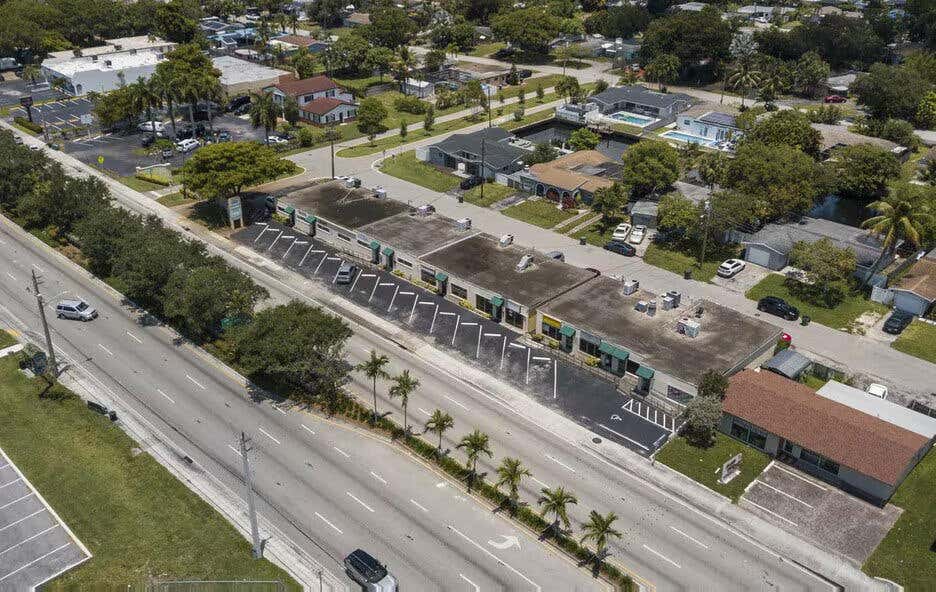 Photo of 1855 W Oakland Park Boulevard, Oakland Park, FL 33311 (MLS # B26047880)