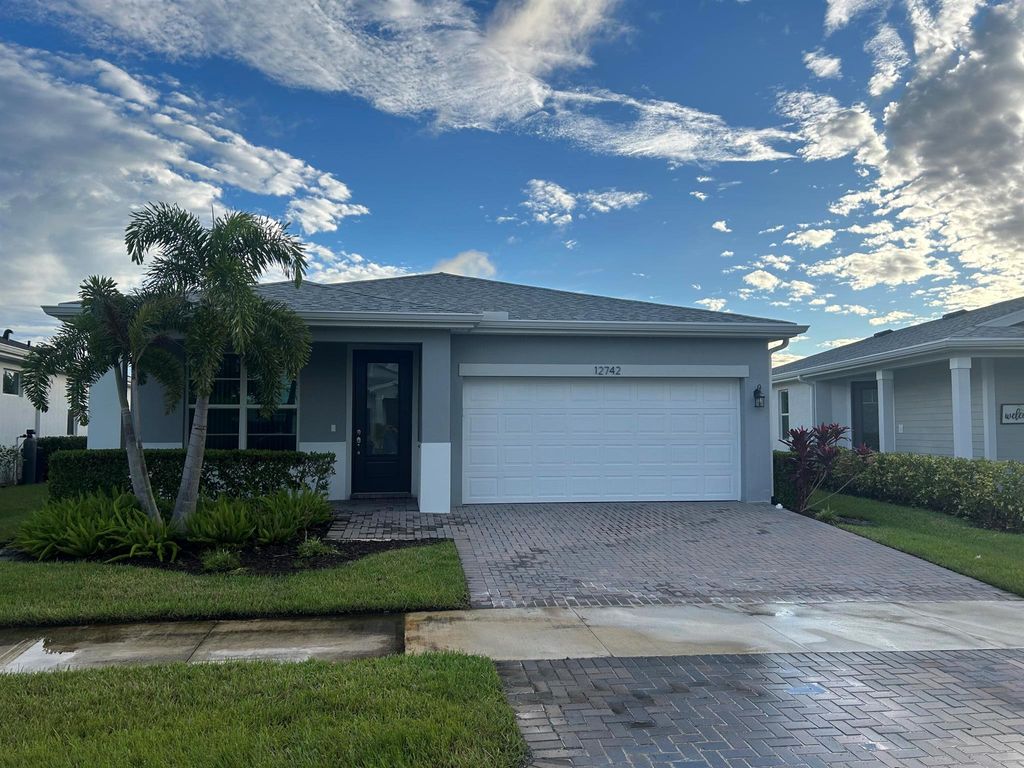 Photo of 12742 SW Phoenix Drive, Port St Lucie, FL 34987 (MLS # R11131145)