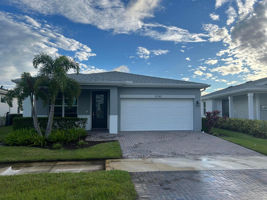 Photo of 12742 SW Phoenix Drive, Port Saint Lucie, FL 34987 (MLS # R11131145)