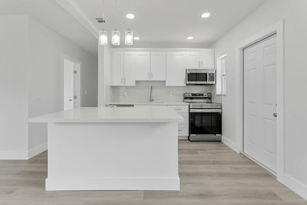 Photo of 1415 S D Street, Lake Worth Beach, FL 33460 (MLS # R11010537)