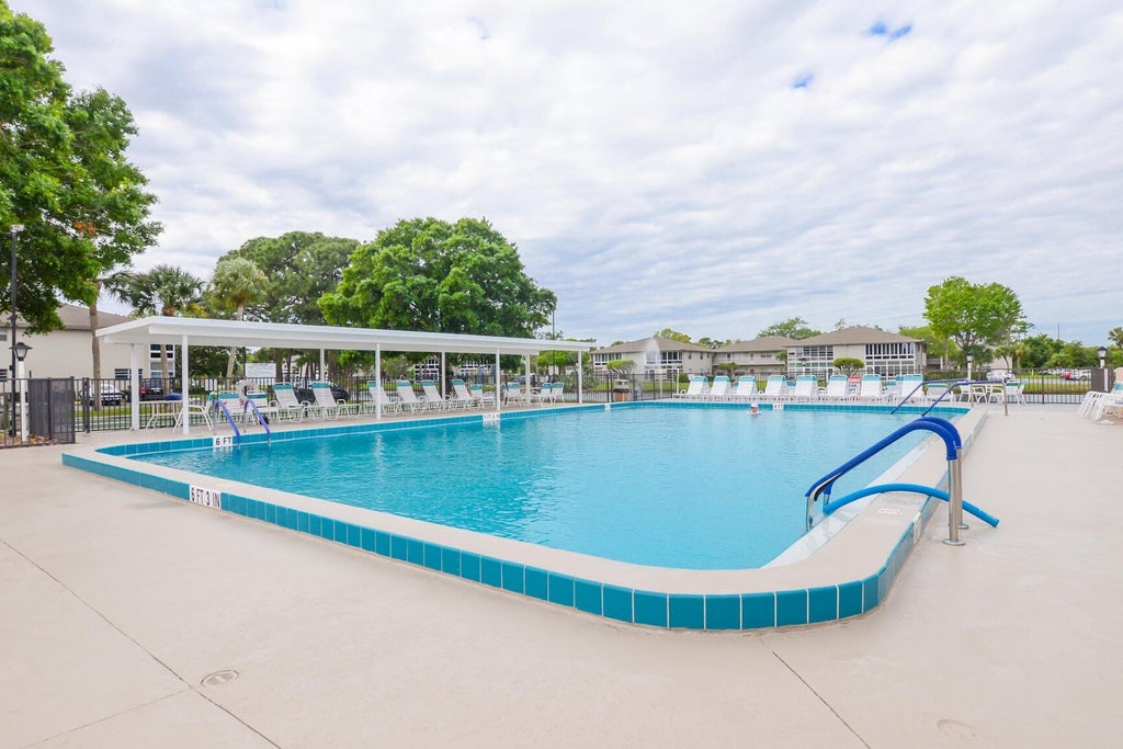 Photo of 13 Lake Vista Trail #202, Port Saint Lucie, FL 34952 (MLS # R11103996)
