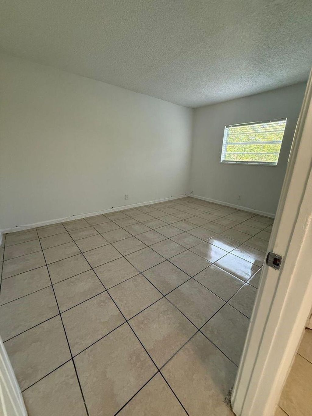 Photo of 3800 Riverside Drive #4, Coral Springs, FL 33065 (MLS # F10517007)