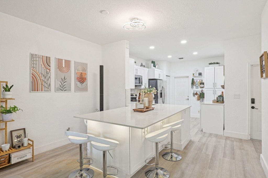 Photo of 3875 Tree Top Drive, Weston, FL 33332 (MLS # B26016942)