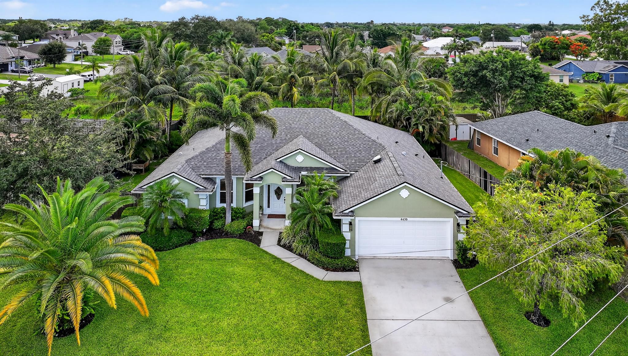 Experience refined living in this beautifully upgraded 4-bedroom, 3-bathroom single-level home, ideally positioned just off Becker Road between I-95 and the Florida Turnpike is a commuter's dream location. Thoughtfully designed with spacious separation from neighboring homes, this property offers rare privacy and an atmosphere of serene exclusivity. Inside, enjoy generously sized bedrooms and tastefully renovated bathrooms that exude modern elegance. Step outside into a true entertainer's paradise an expansive, private backyard oasis perfect for gatherings or quiet moments of relaxation. This is Florida living at its finest where luxury, space, and location converge seamlessly.