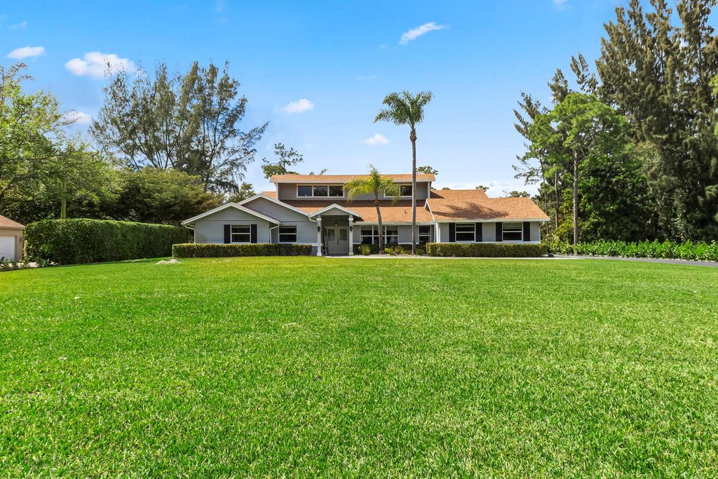 Photo of 6249 NW Nw 65th Terrace, Parkland, FL 33067 (MLS # R10969529)