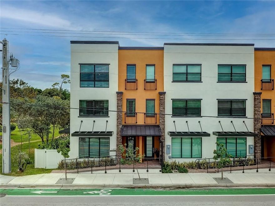 Exceptionally appointed & stylish New Construction townhome in South Middle River right on the park! This 3 bed/3.5 bath, 2 car garage townhome has been “Finished to The 9’s”! Upgrades galore: wood plank porcelain tile floors throughout, electric screens for garage and upstairs balcony, custom light fixtures, designer window treatments & drapes, paneled doors, all closets built out with closet systems. Kitchen offers an open concept with oversized breakfast bar, quartz countertops, subway tile backsplash, oversized double door SS refrigerator and all new SS appliances. Expansive Master bedroom suite with double door entry, custom closets. Guest bedroom also features on suite bathroom, 3rd bedroom currently functioning as a downstairs den/flex space but could easily be converted bedroom. Corner unit with additional windows, views of the park and great natural light. Perfect location just 5 minutes to exciting downtown Fort Lauderdale, Wilton Manors and Fort Lauderdale Beach!