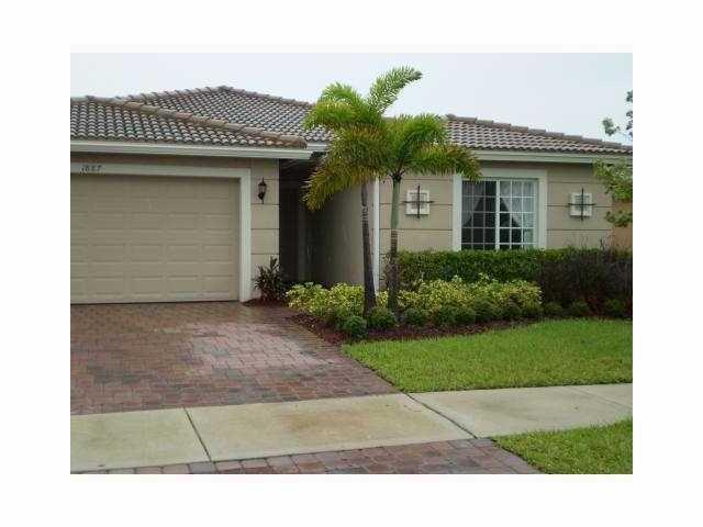 Spacious 3 Bedrooms, 2 Bathrooms, 2 Car garage. Formal living room, dining room and family room, and the breakfast area overlooks the lake,. This house was the model home for Newport Isles. Two miles away from Tradition hospital, mall and I-95. Clubhouse; Fitness Center; Pool; Tennis, internet all included.