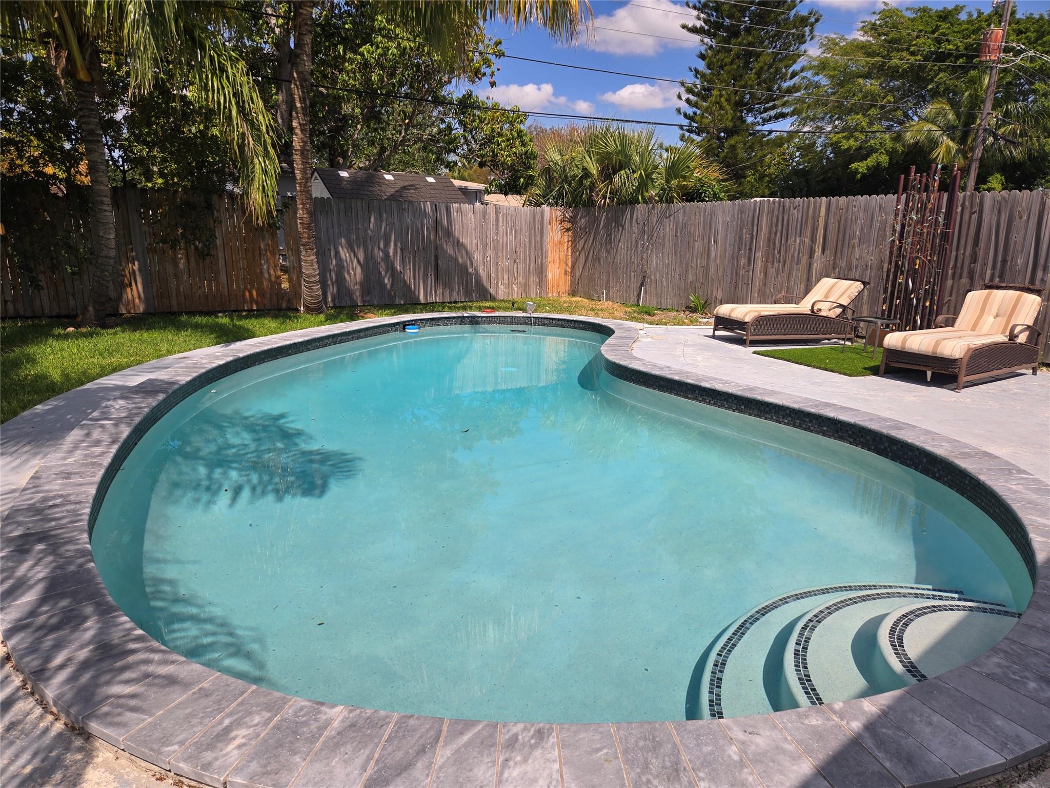 View photos, virtual tours, details... 5241 NE 15th Ter