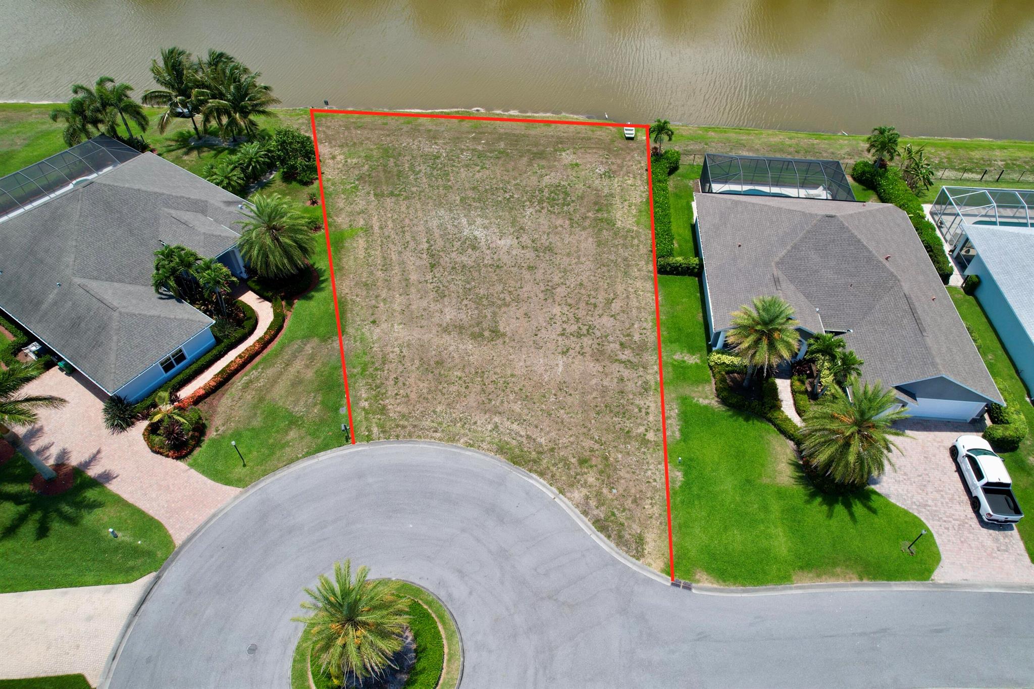 This is the last remaining lot in the coveted Sawgrass Lakes Estates section. This oversized waterfront lot is the ideal location for your new build. One of the few communities in Port St. Lucie where you can bring your own builder, Sawgrass Lakes Estates offers a unique opportunity. Don't let this chance to secure a prime piece of waterfront property slip away!