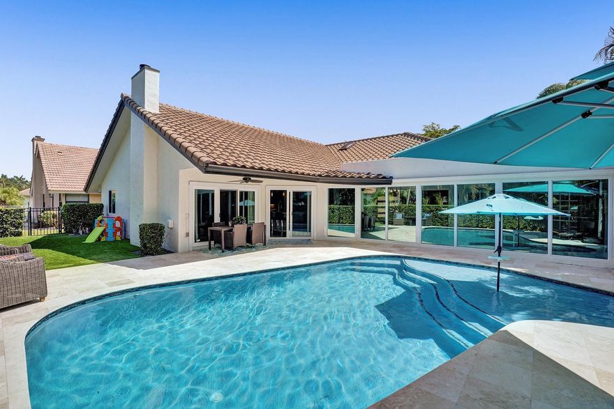 Updated from top to bottom, new roof to gorgeous new Italian floors and everything in-between. Located in the coveted tree-lined gated community of Parkside, newly zoned for East Boca's Addison Mizner K-8 school. Upon arrival, guests are instantly captivated by the beautiful volume ceilings and sparkling pool views. Home is completely hurricane impact protected with the highest grade windows and doors. Newly resurfaced heated pool with sundeck and turf yard, perfect for backyard gatherings. Fresh ultra-modern primary bathroom is complete with steam shower, marble tile, elegant stone tub, private covered patio, sauna, designer master closet and a custom glass linen closet that will leave you speechless. Gourmet kitchen with quartz counters. Showing Wednesday & Thursday by appointment. Custom California Closets in all bedrooms including one-of-a-kind entry way locker system. New AC, freshly painted exterior and much more!