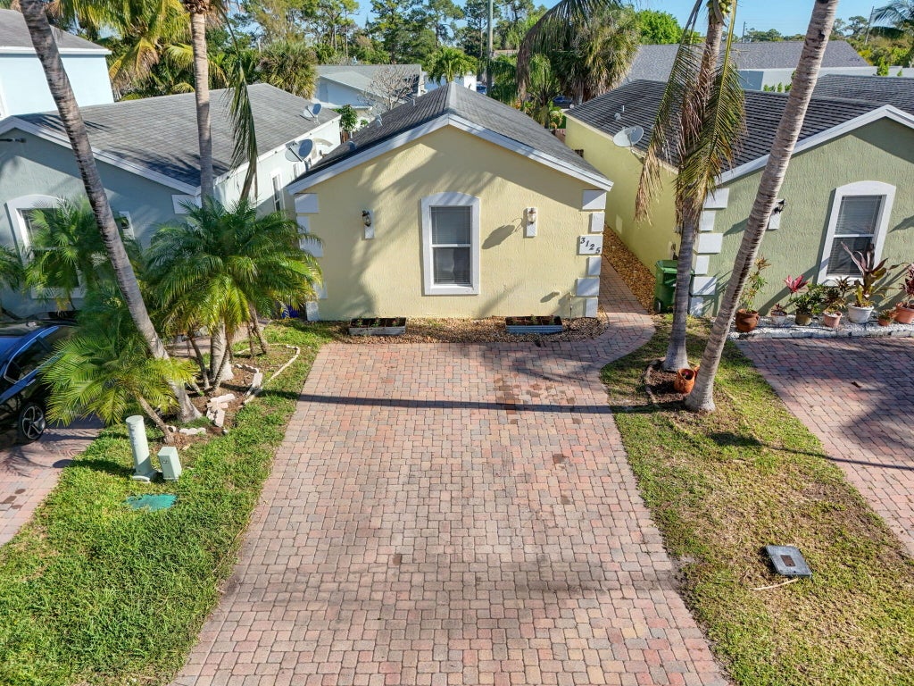 Photo of 3125 Shelby Way, Palm Springs, FL 33461 (MLS # B26047859)