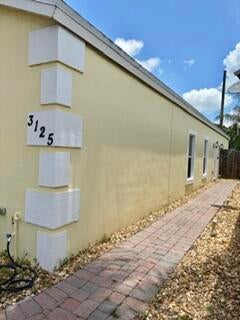 Photo of 3125 Shelby Way, Palm Springs, FL 33461 (MLS # B26047859)