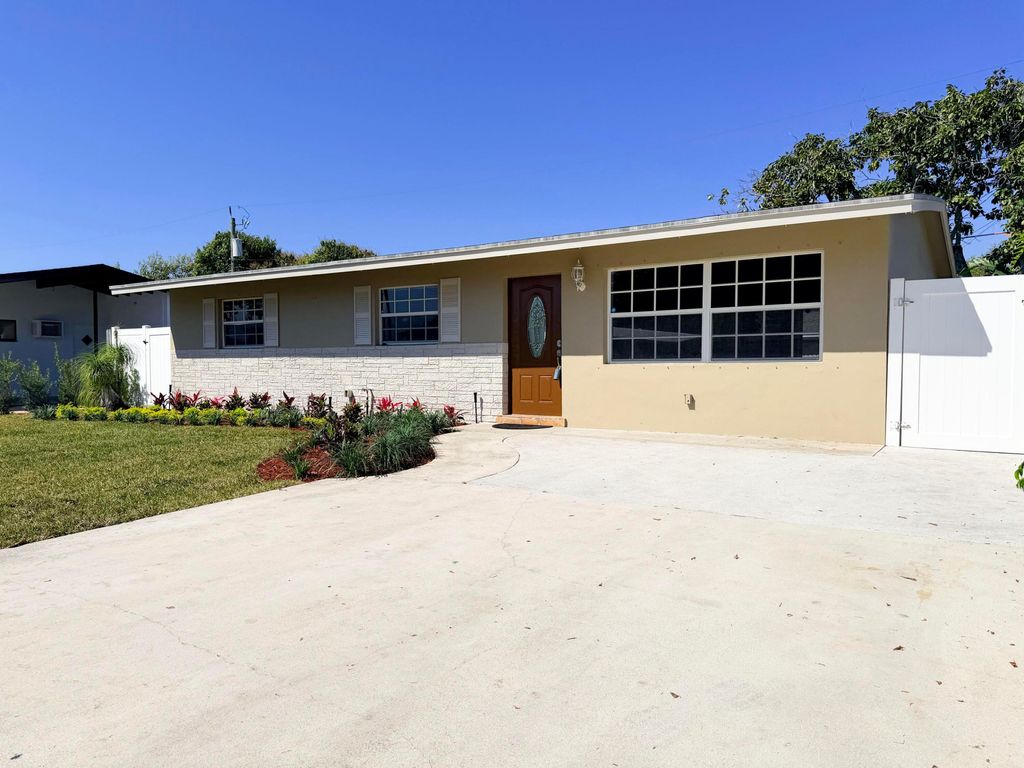 Photo of 63 Andros Road, Palm Springs, FL 33461 (MLS # R11165888)