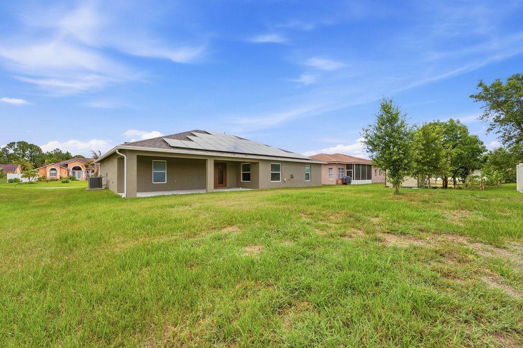 Photo of 1692 SW Alvaton Avenue, Port Saint Lucie, FL 34953 (MLS # B26032304)