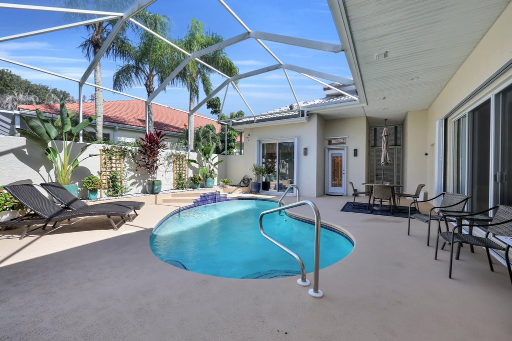 Photo of 831 ISLAND CLUB Square, Vero Beach, FL 32963 (MLS # B26080948)