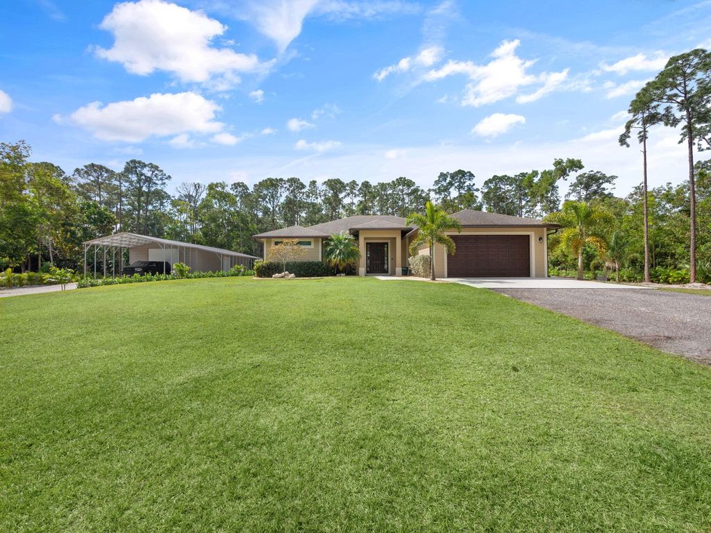 Photo of 13430 158th Street N, Jupiter, FL 33478 (MLS # R10974443)