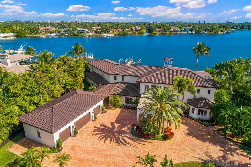 Newly renovated transitional home on custom gated estate situated on 1.5 acres with 140 ft directly on the Loxahatchee River in Tequesta. This luxury waterfront property boasts 5 bedrooms, 6.1 baths, 6 car garage, with detached guest house with over 10,000+ sf, & clay tennis courts. New renovations include distressed wood flooring upstairs & downstairs; Downsview kitchen, Thermador double fridge, LaCornue gas oven, Cristallo counters, wine room, new baths, expansive his-&-hers custom closets with over-sized islands & custom built-in lighting & chandeliers, new woodwork, shiplap, decking, landscaping, salt-water pool & much more. Control4 smart automation system throughout entire house Newly renovated transitional home on custom gated estate situated on 1.5 acres with 140 ft directly on the Loxahatchee River in Tequesta. This luxury waterfront property boasts 5 bedrooms, 6.1 baths, 6 car garage, with detached guest house with over 10,000+ sf, & clay tennis courts. New renovations include distressed wood flooring upstairs & downstairs; Downsview kitchen, Thermador double fridge, LaCornue gas oven, Cristallo counters, wine room, new baths, expansive his-&-hers custom closets with over-sized islands & custom built-in lighting & chandeliers, new woodwork, shiplap, decking, landscaping, salt-water pool & much more. Control4 smart automation system throughout entire house.

With sweeping views of the river from almost every room, this property is truly a boater's paradise with 2 boat docks & 3 lifts (one for 30K lbs & two for 10K lbs) on prestigious Anchorage Point along the Loxahatchee River!