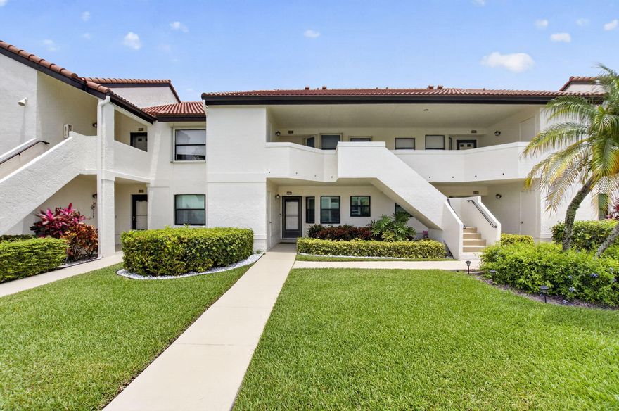 Experience the ultimate Florida lifestyle in this meticulously maintained and super clean 2-bedroom, 2-bathroom condo, where soaring cathedral ceilings create an airy, expansive atmosphere that perfectly complements the sweeping views of the lush golf course and abundant green space. This move-in-ready second-floor residence offers unparalleled peace of mind with a brand-new AC installed in February 2026, a 2024 washer/dryer and refrigerator, and a 2018 water heater. Step out onto the screened-in lanai to take in the serene surroundings.  See Supplement The greatest value lies in the "all-inclusive" HOA, which covers water, pest control, roof maintenance, exterior painting, and an impressive Xfinity Triple Play package featuring high-speed internet, premium cable, and home phone. Residents enjoy access to three community pools and an active clubhouse, all while being exempt from mandatory country club memberships. With miles of scenic sidewalks and a maintenance-free lifestyle, this spotless gem is the perfect retreat for those seeking luxury without the extra fees.