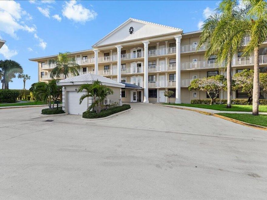 PRICE REDUCED! Exceptional value in Whitehall Village! This top-floor corner unit offers the perfect combination of privacy, space, and convenience. Enjoy elevator access and a flexible floor plan ready for your personal updates and design vision. The bright and spacious living area flows seamlessly into the dining space and kitchen, creating an inviting layout ideal for everyday living and entertaining. The primary suite features a walk-in closet and private en-suite bath, while the guest bedroom is conveniently situated near a separate full bathroom, providing comfort and privacy for residents and visitors alike.  One of the home's most desirable features is the oversized in-unit laundry and utility room, offering abundant storage space and flexibility for a workshop, hobby area, or add