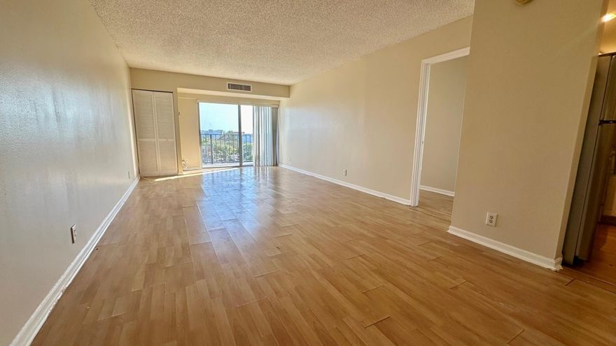 Scacious 2-bedroom, 2-bath condo featuring new laminate flooring. Prime location close to the airport, beaches, and abundant shopping and dining destinations. Securely maintained building with resort-style amenities including swimming pool, tennis courts, fitness room, sauna, car wash station, and library. Spacious on-site coin laundry facility. No pets permitted. Includes 1 assigned parking space plus 1 additional vehicle allowed. A $300 refundable association deposit will be required. Move-in requires the first month’s rent and 2 months’ security deposit. HOA mandates a minimum credit score of 675 per applicant. Home Solutions will complete its own background screening before submitting to the HOA. Assigned parking space #103 is located on the second level.