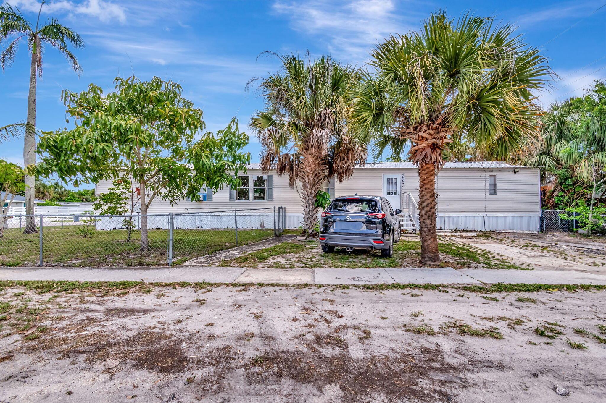 5864 Cartier Road, West Palm Beach, FL, 33417/$319,900 3 5864 Cartier Road