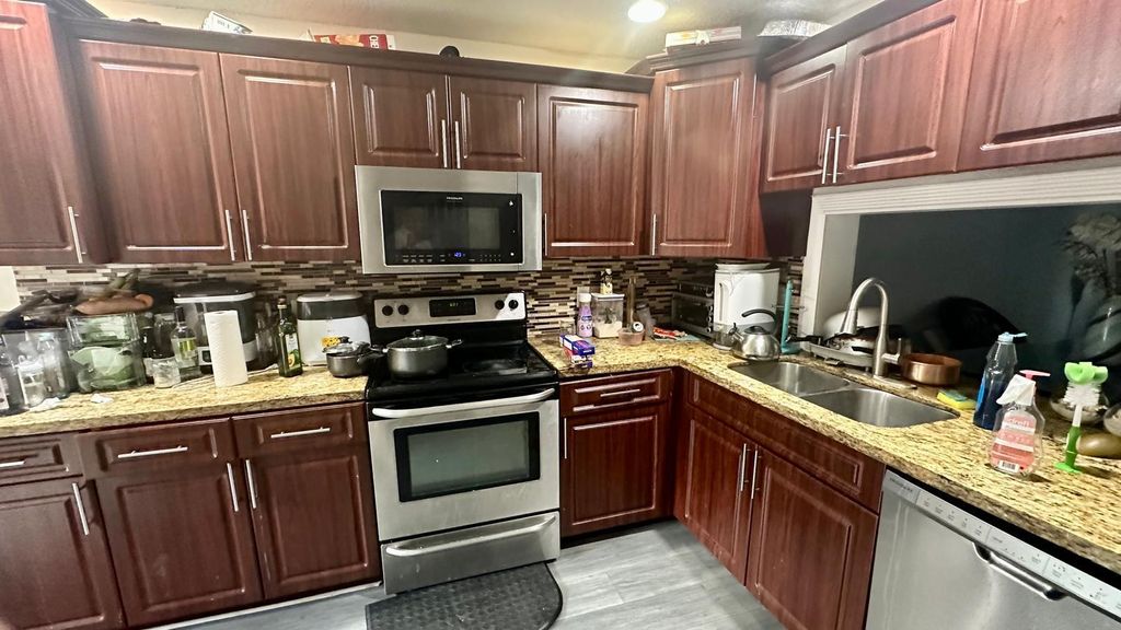 Photo of 2213 NW 45th Avenue, Coconut Creek, FL 33066 (MLS # B26003265)