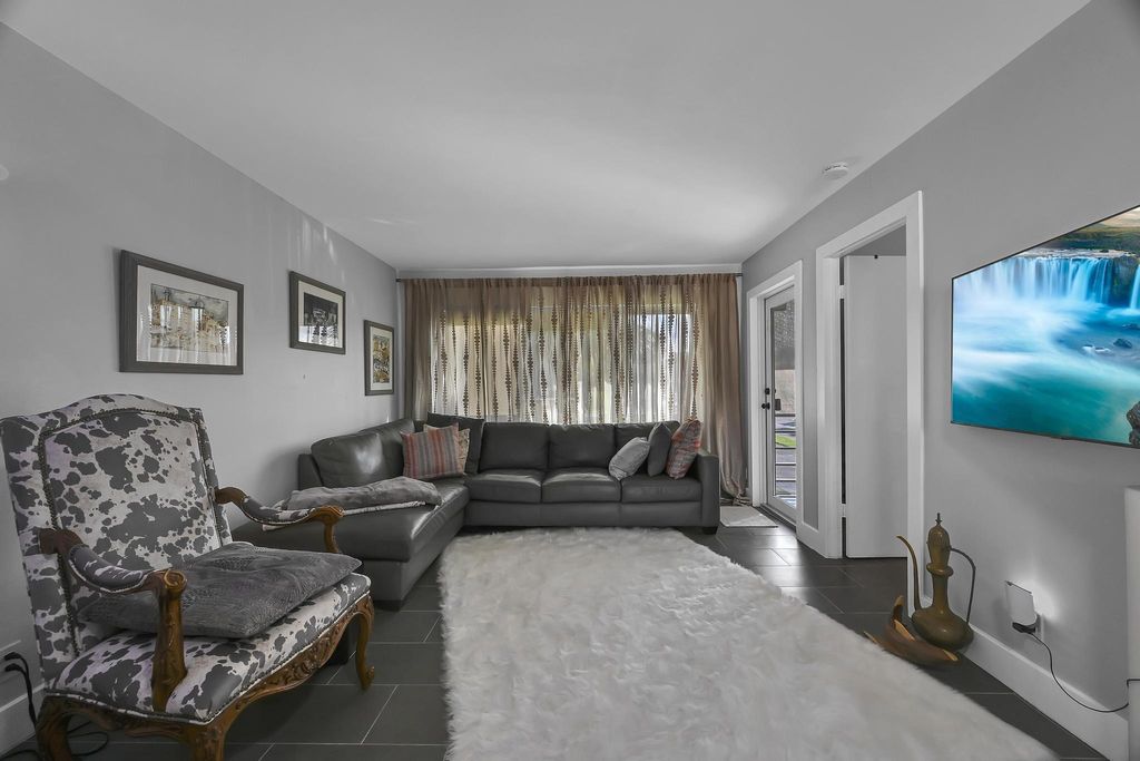 Photo of 203 Lake Carol Dr, West Palm Beach, FL 33411 (MLS # B26001017)