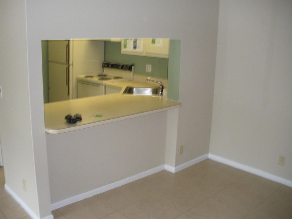 Photo of 206 Foxtail Drive #E1, Greenacres, FL 33415 (MLS # R11106045)