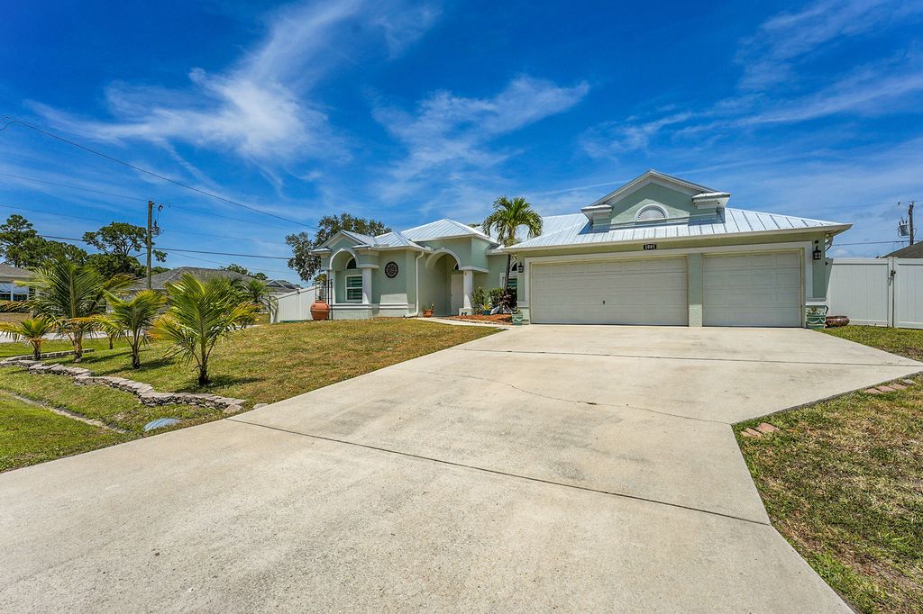 Photo of 1085 SW Consolata Avenue, Port Saint Lucie, FL 34953 (MLS # R11083782)