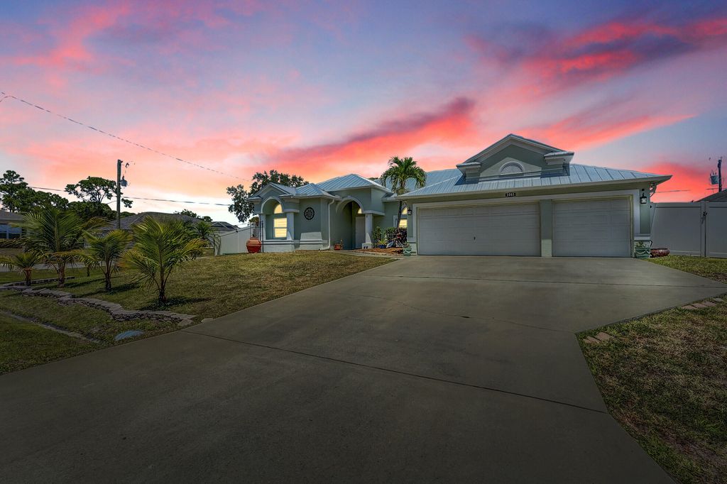 Photo of 1085 SW Consolata Avenue, Port Saint Lucie, FL 34953 (MLS # R11083782)