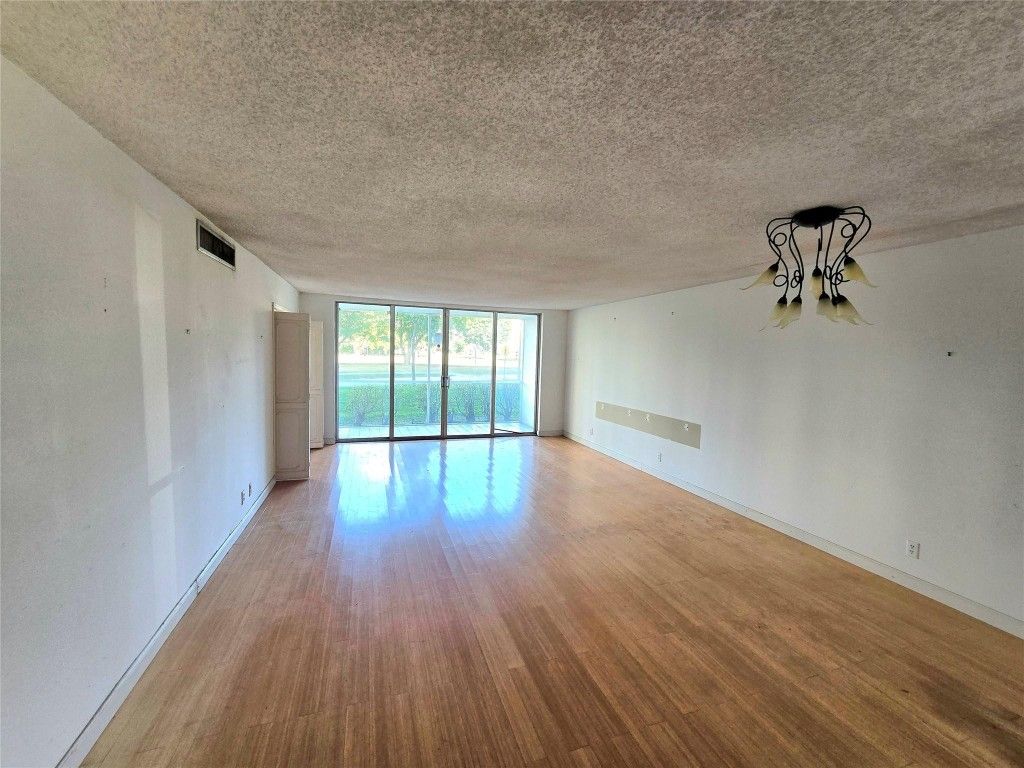 Photo of 2940 N Course Drive #112, Pompano Beach, FL 33069 (MLS # F10536364)